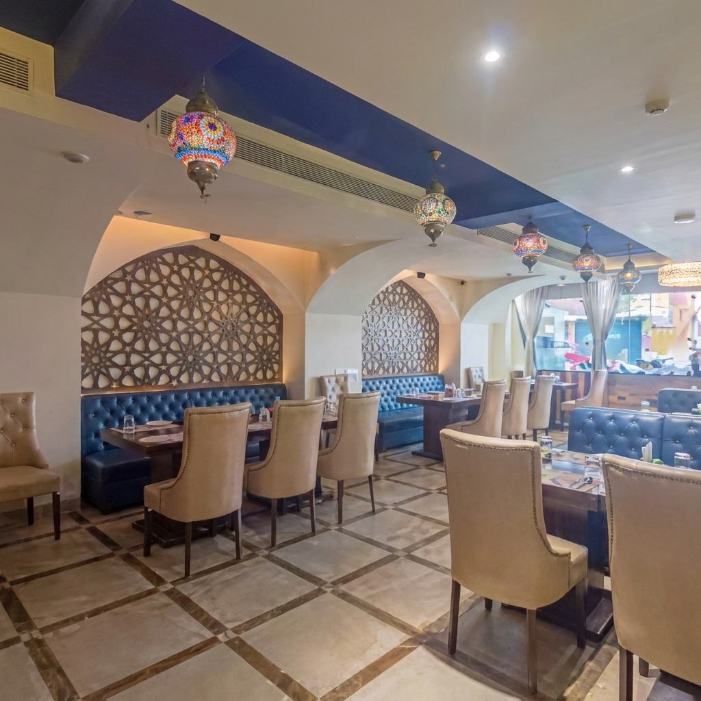 Family-friendly dining room at Pankhuri Restaurant inside Hotel Moti Palace